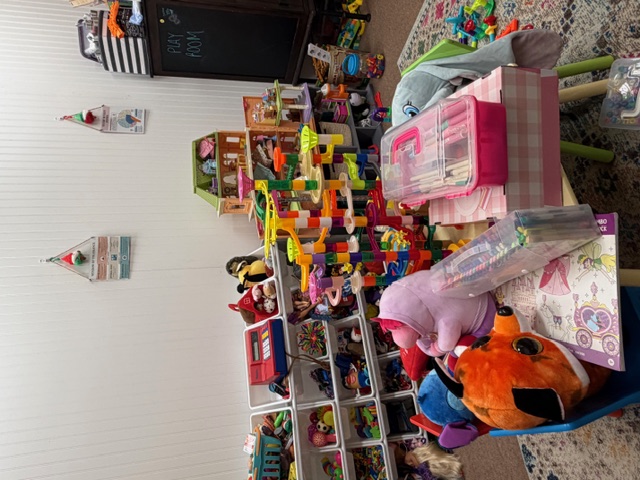 Colorful play therapy room filled with toys for children