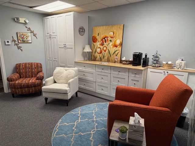 Cozy room with tulip painting and coffee station